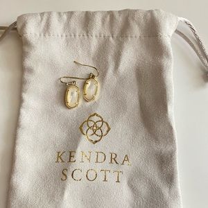 Kendra Scott gold and white earrings